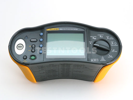 A Fluke 1662 Multifunction Tester device with a black and yellow plastic housing, featuring a central LCD screen, rotary dial, and various control buttons on a white background.